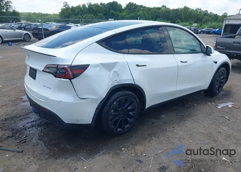 2023 Tesla Model Y Awd/Long Range Dual Motor All-Wheel Drive z USA, uszkodzony, nr VIN 7SAYGDEE8PA059111